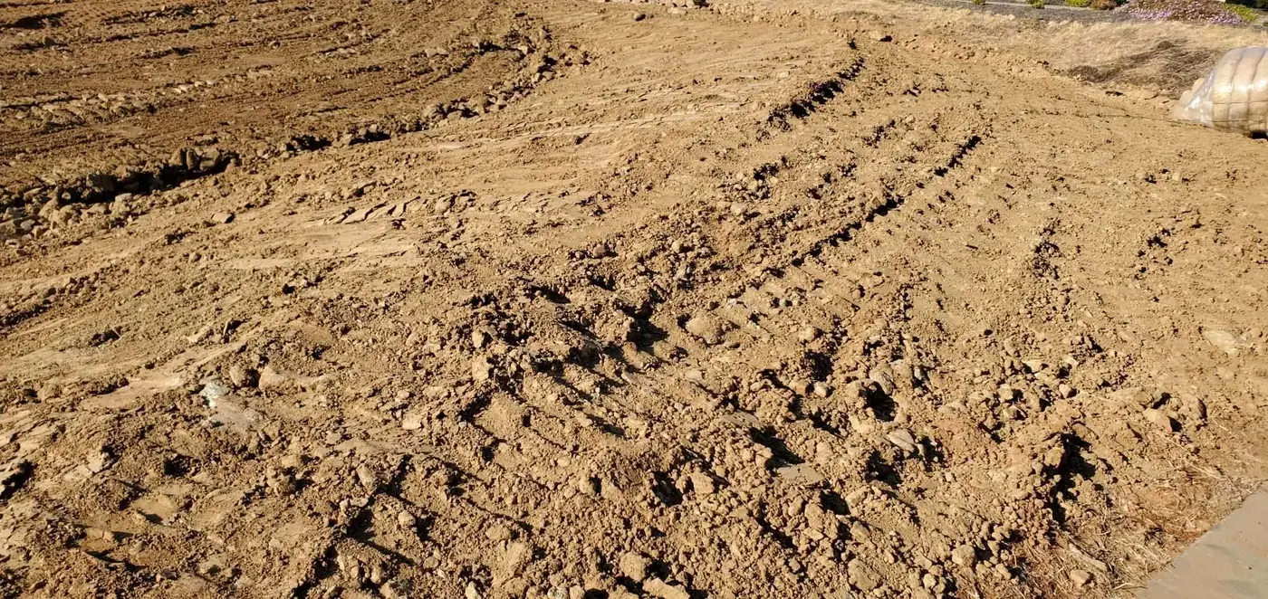 Clay fill dirt stockpiled ready to be spread